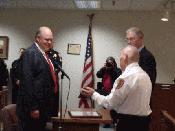 Captain Chimento presenting Chief Card with Mayor's Award